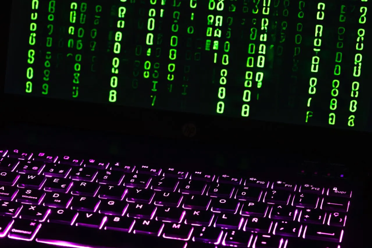 Laptop displaying code, a symbol of on-device AI processing